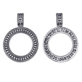 Handmade Bali silver circle pendant with reversible dotted and floral design